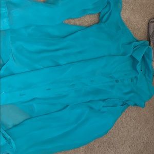Open shoulder teal long sleeve shirt